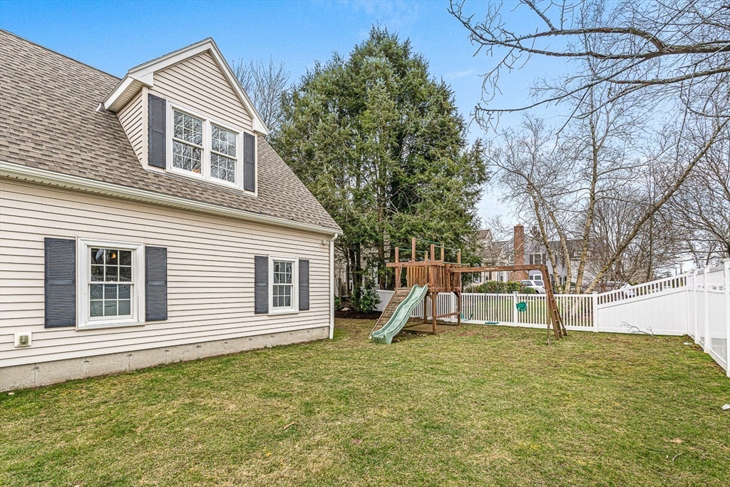 54 Homestead Park Needham, MA 02494 - Photo 26 of 26 a view of a house with a backyard and a tree