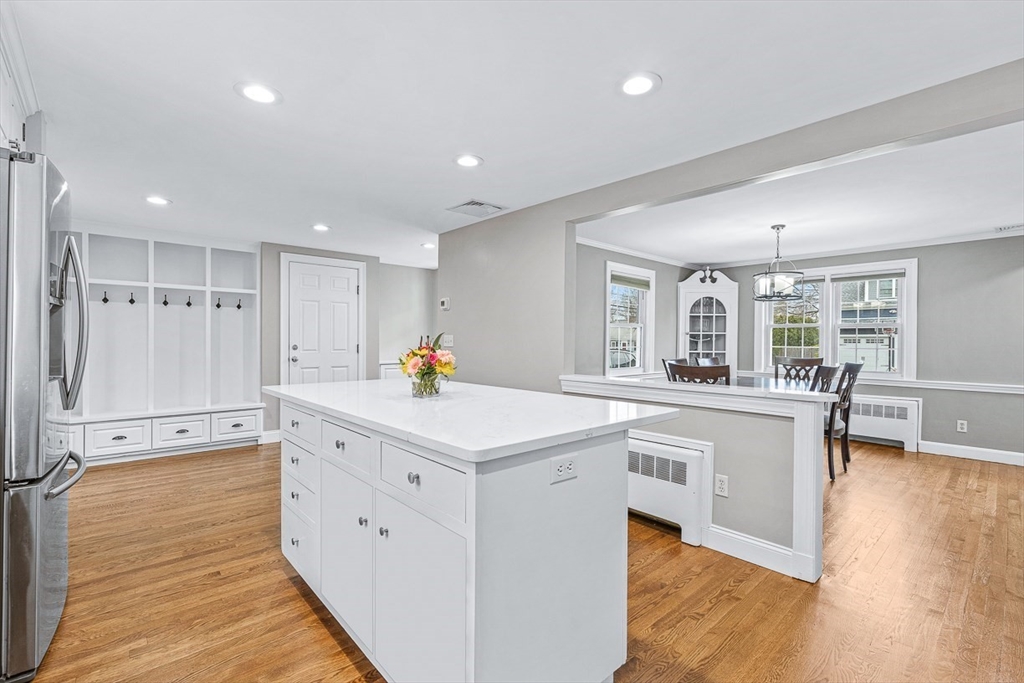 54 Homestead Park Needham, MA 02494 - Photo 4 of 26 a kitchen with white cabinets and sink