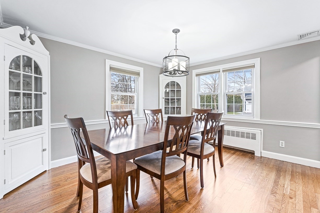 54 Homestead Park Needham, MA 02494 - Photo 6 of 26 a view of a dining room with furniture wooden floor and chandelier