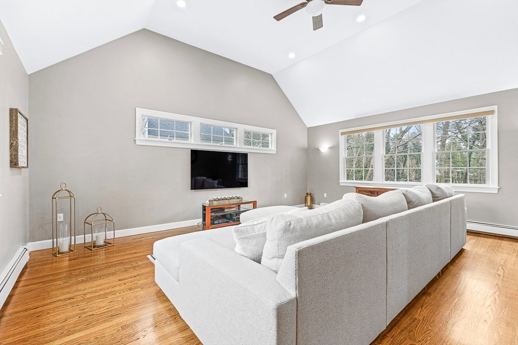 54 Homestead Park Needham, MA 02494 - Photo 7 of 26 a living room with furniture and a flat screen tv