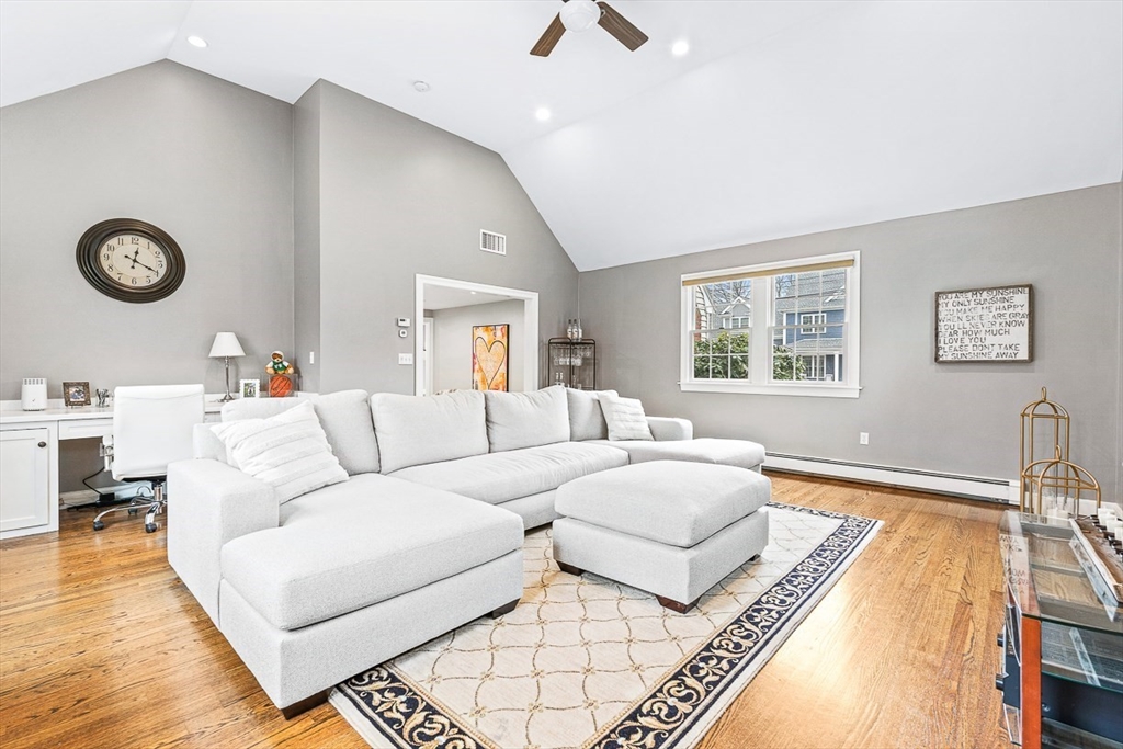 54 Homestead Park Needham, MA 02494 - Photo 8 of 26 a living room with furniture and a table