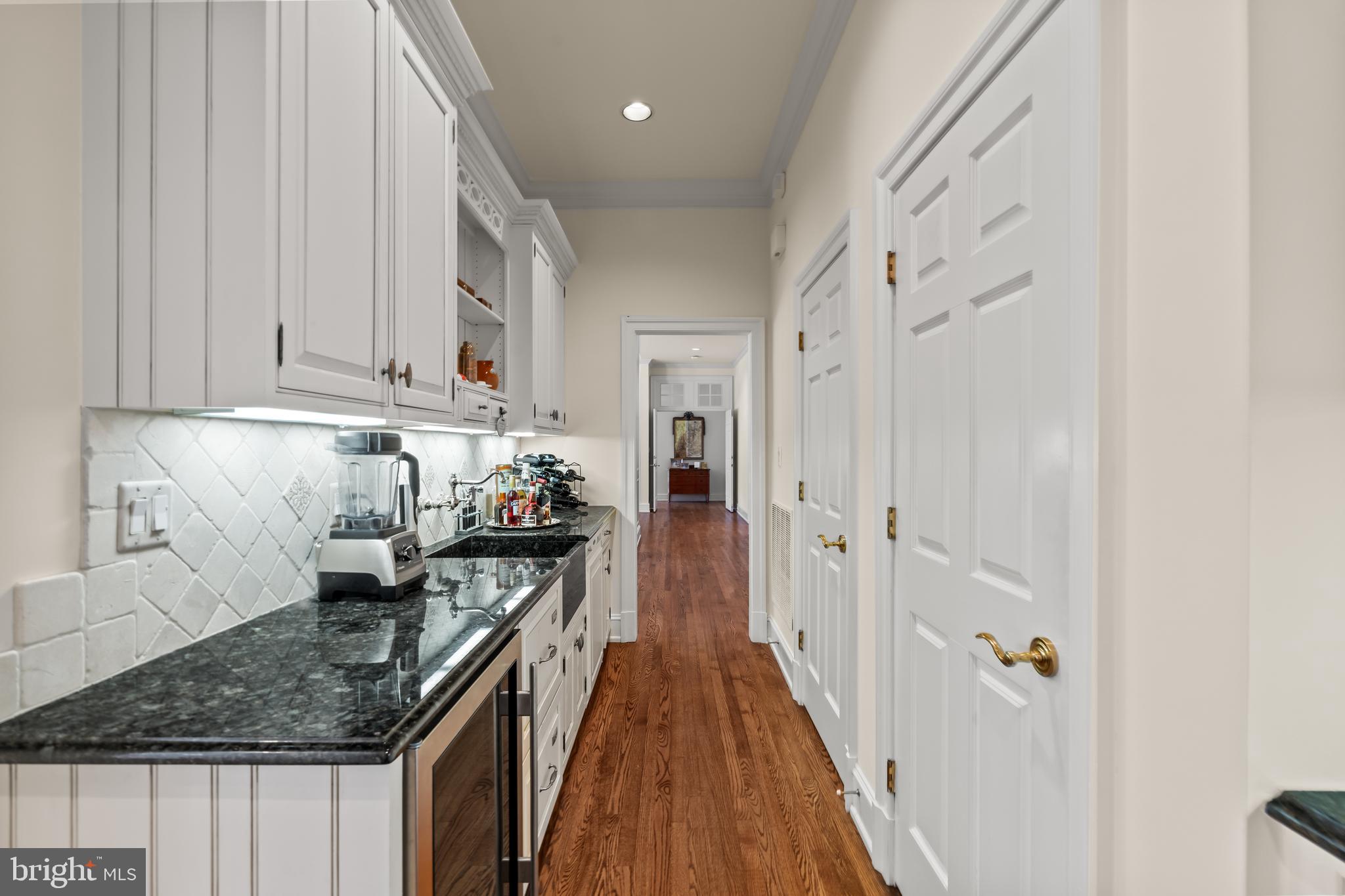 1110 Harvey Road McLean, VA 22101 - Photo 19 of 87 Wine Storage and Sink in Butler's Pantry
