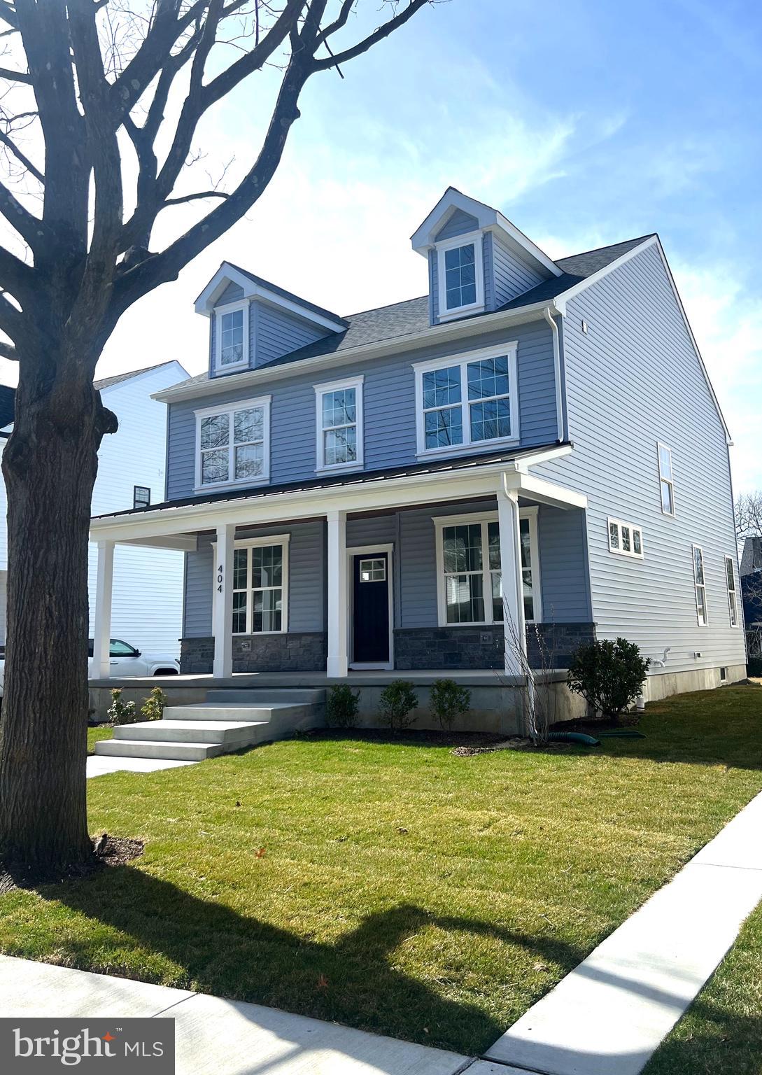 404 Midway Riverton, NJ 08077 - Photo 19 of 20 a front view of a house with a yard table and chairs