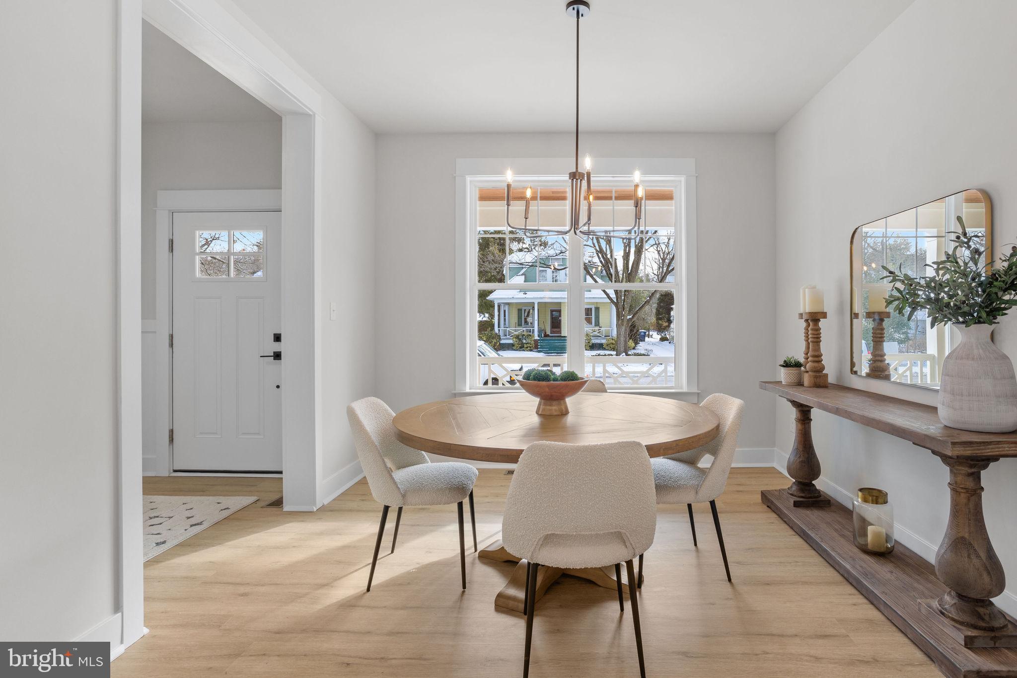 404 Midway Riverton, NJ 08077 - Photo 8 of 20 a view of a dining room with furniture window and wooden floor
