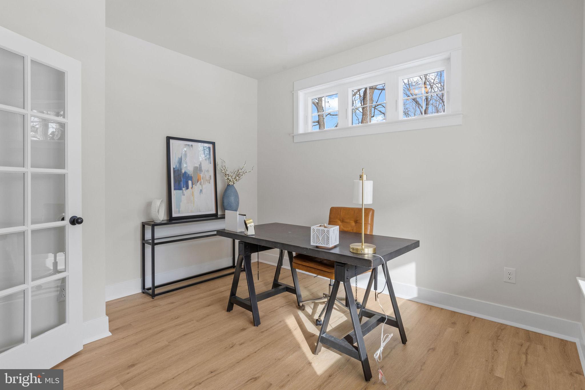 404 Midway Riverton, NJ 08077 - Photo 10 of 20 a view of a workspace with furniture and wooden floor