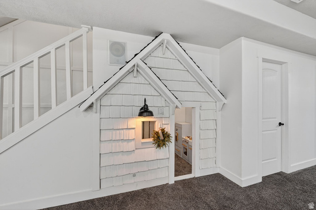 14714 South Bright Wood Road Herriman, UT 84096 - Photo 34 of 41 Under stairs play house with lighting and a window