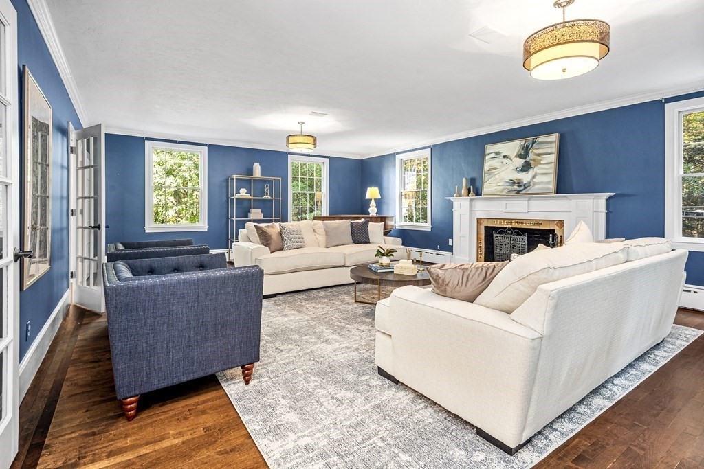 6 Peter Hobart Drive Hingham, MA 02043 - Photo 12 of 32 a living room with furniture and a fireplace