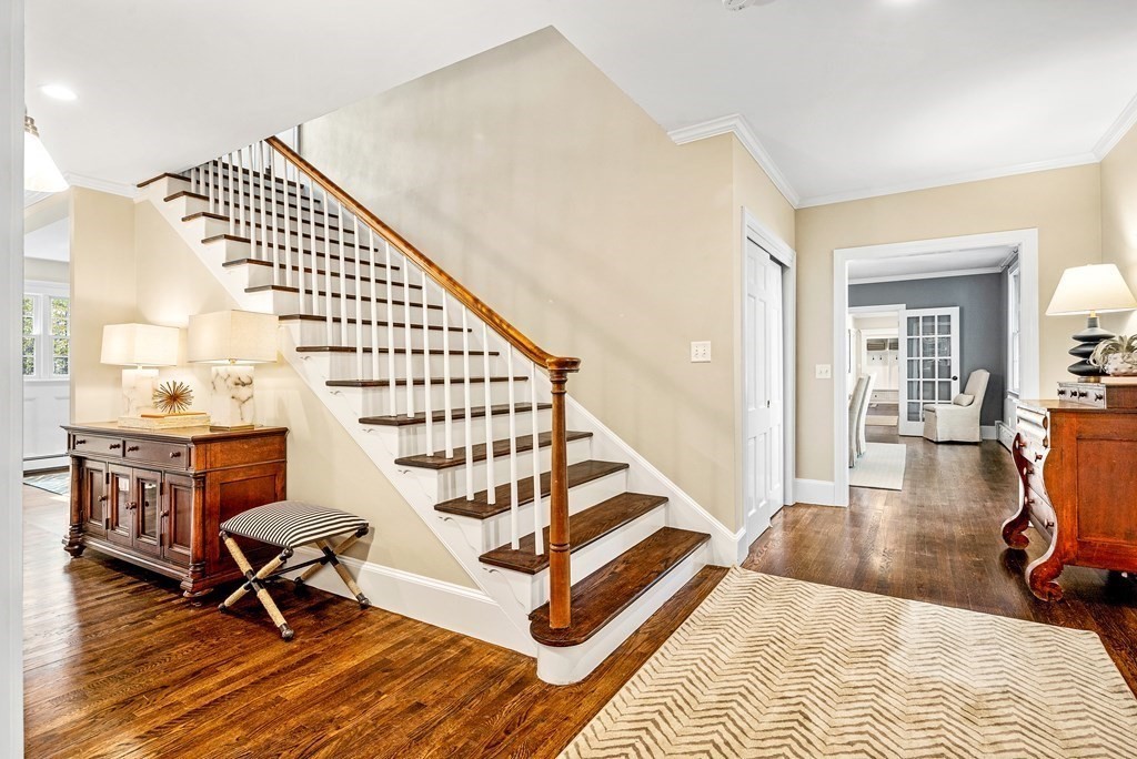 6 Peter Hobart Drive Hingham, MA 02043 - Photo 18 of 32 a view of entryway dining room and hall with wooden floor