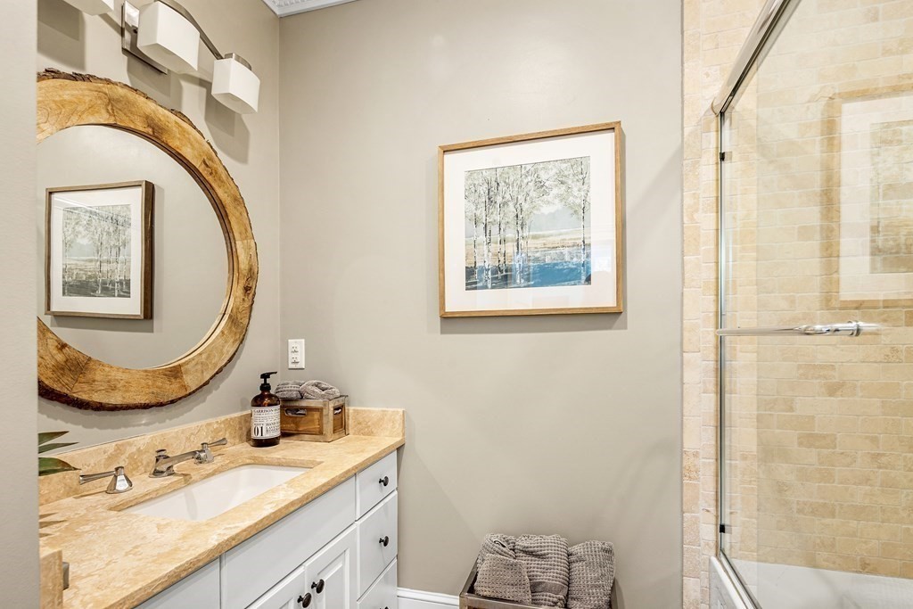 6 Peter Hobart Drive Hingham, MA 02043 - Photo 23 of 32 a bathroom with a sink mirror and vanity