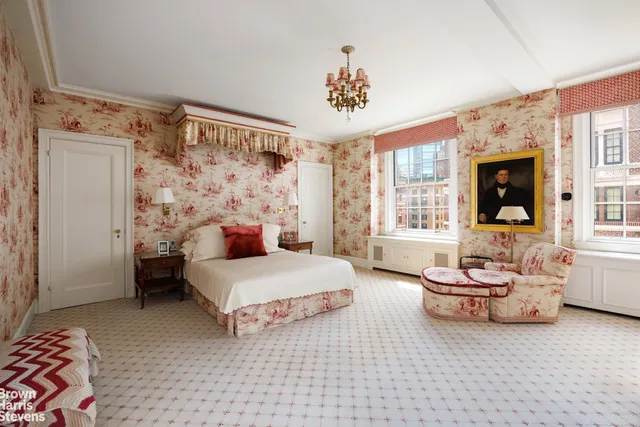 a kitchen with a refrigerator and a sink
