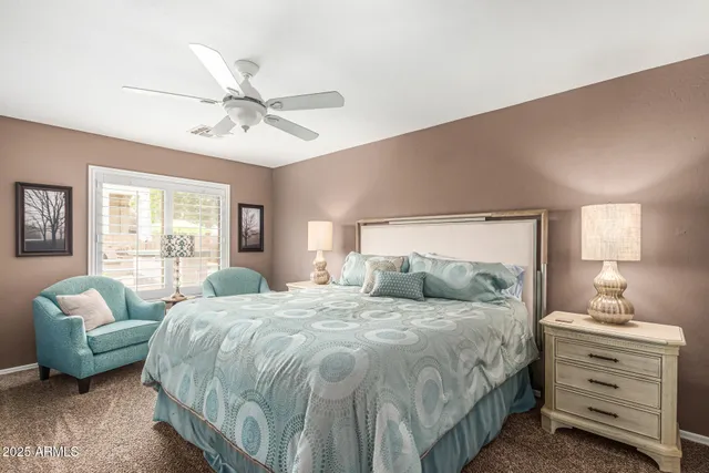 a bedroom with a bed and furniture