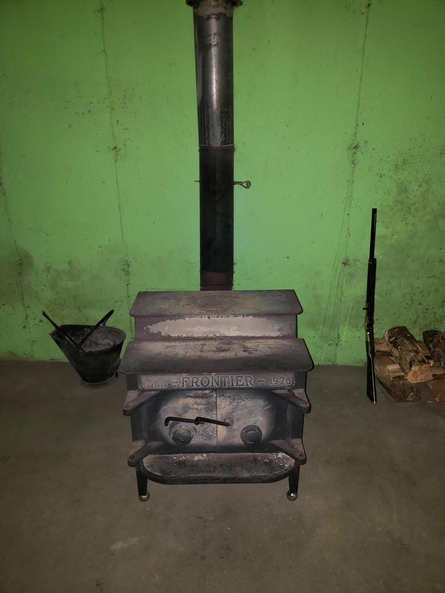 15 Hyde Road Jay, ME 04239 - Photo 27 of 29 Wood stove in basement