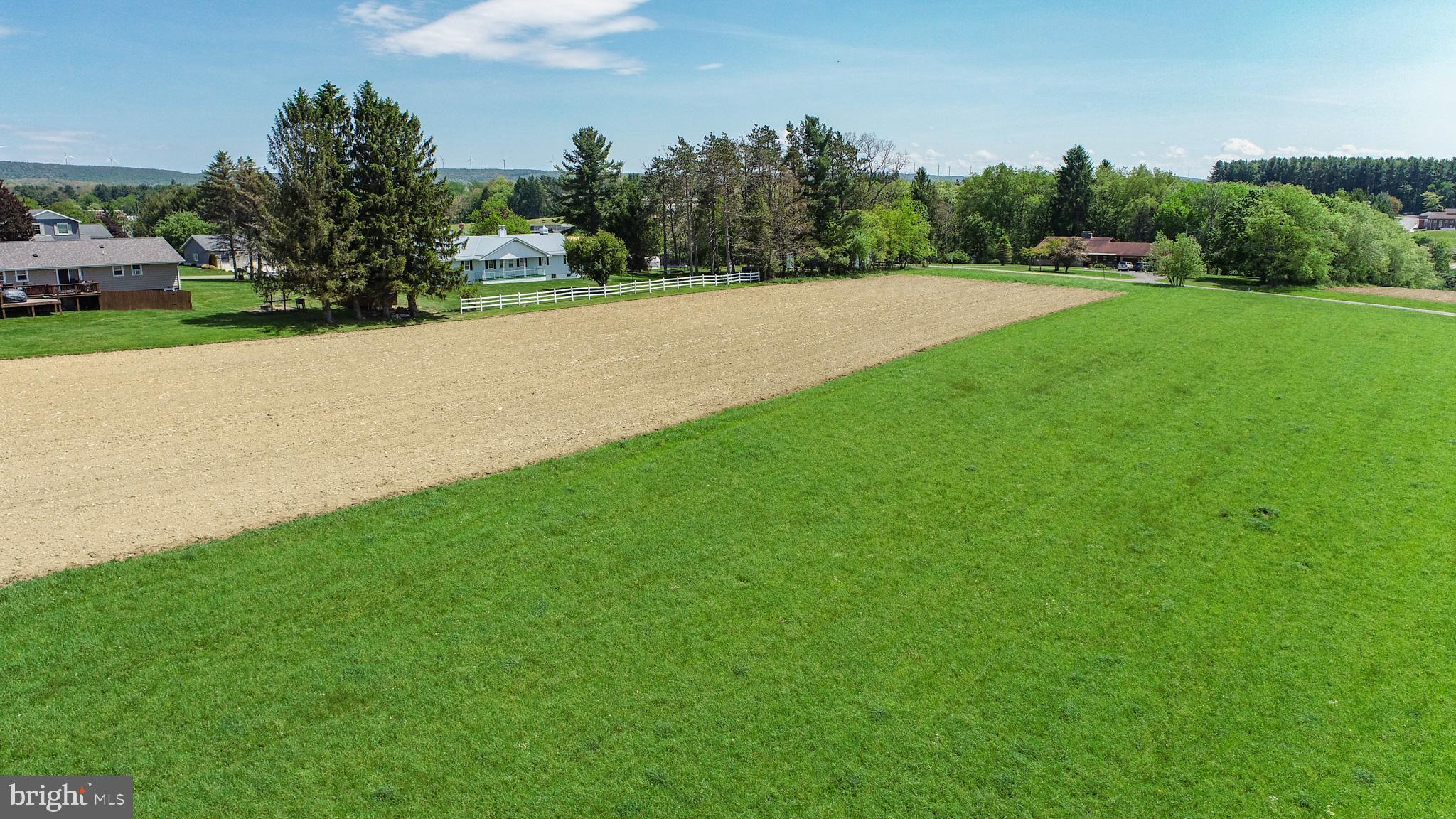 9.75-ac Dennett Road Oakland, MD 21550 - Photo 24 of 30 a view of a field of grass and trees