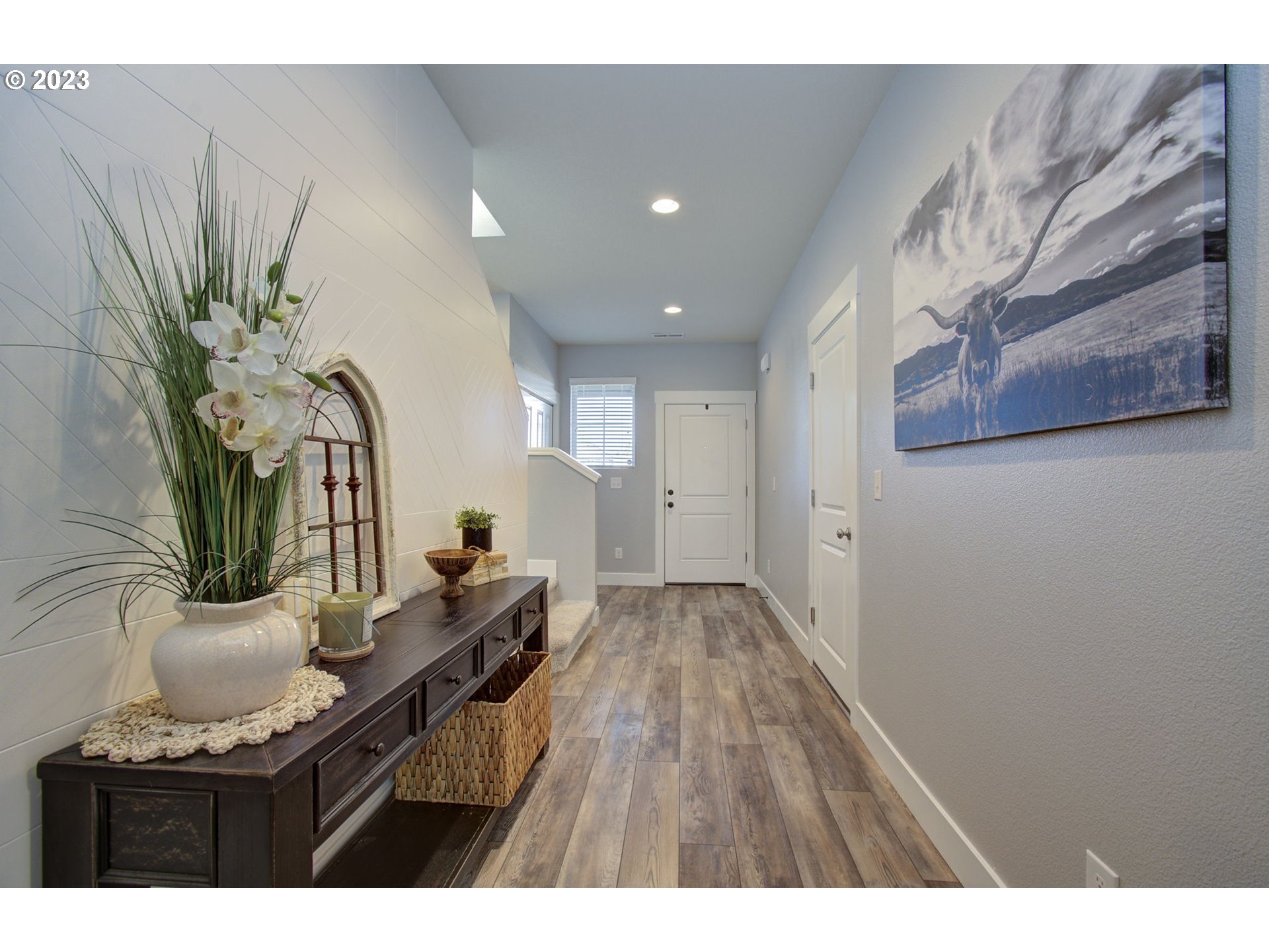 871 North 35th Avenue Ridgefield, WA 98642 - Photo 3 of 36 a view of a living room and a potted plant
