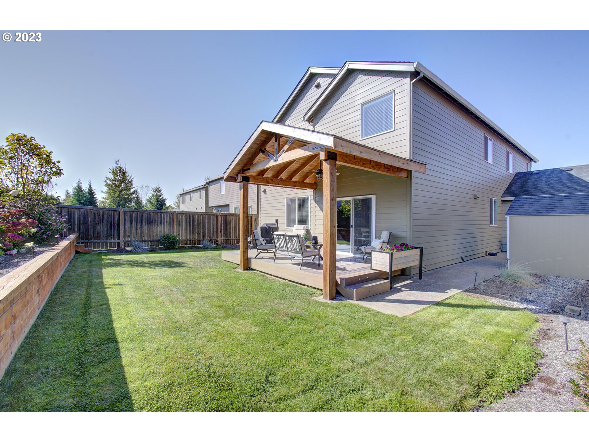 871 North 35th Avenue Ridgefield, WA 98642 - Photo 34 of 36 a view of a house with a yard and sitting area