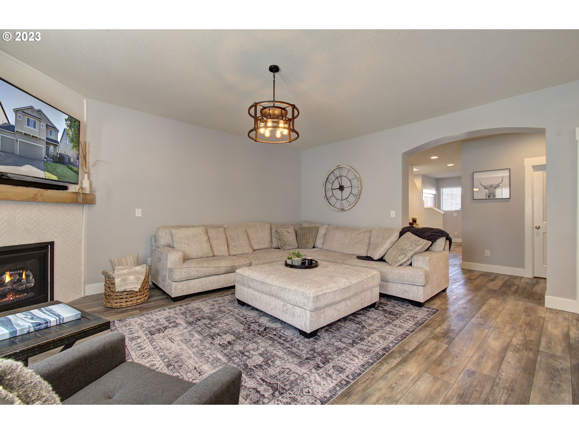 871 North 35th Avenue Ridgefield, WA 98642 - Photo 4 of 36 a living room with furniture and a fireplace