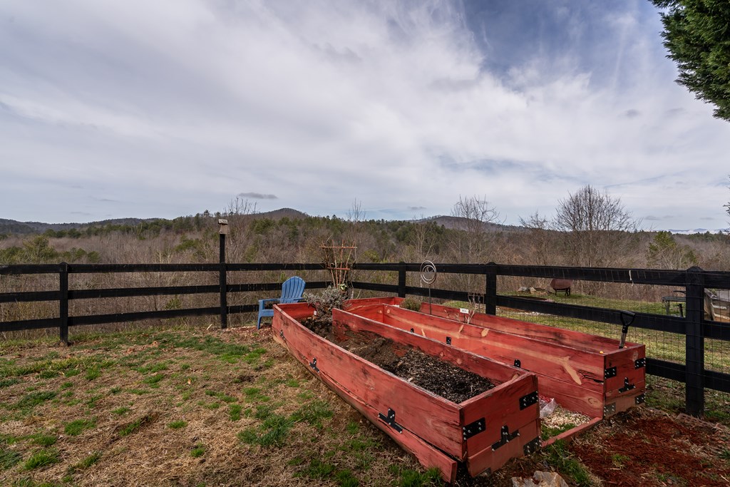 112 Deer Ridge Drive Murphy, NC 28906 - Photo 14 of 55 a view of a roof deck with wooden floor and city view