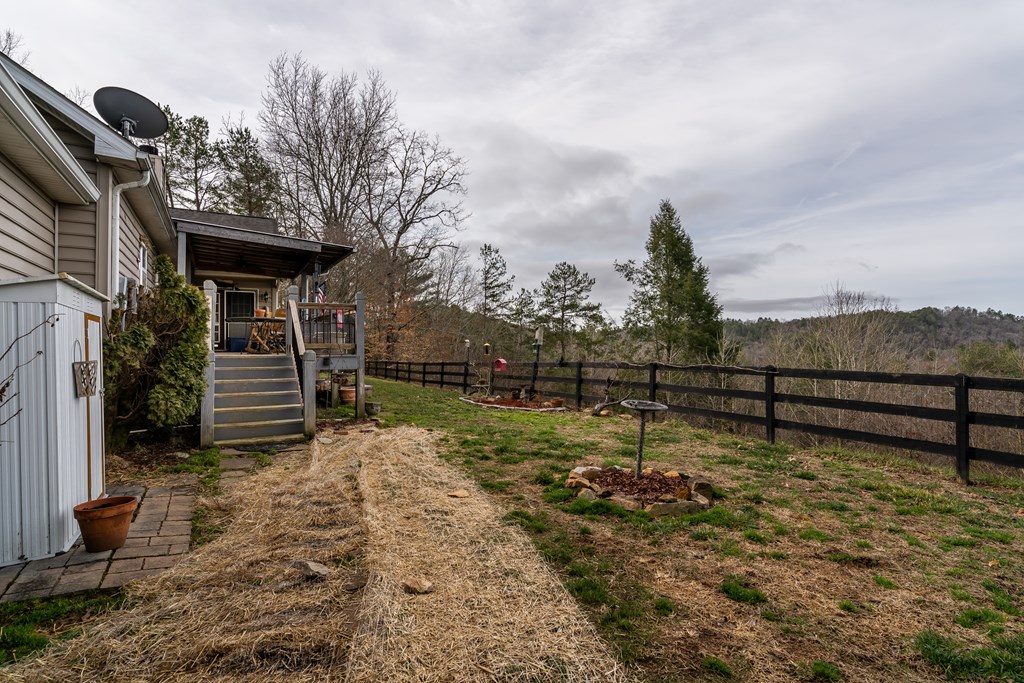 112 Deer Ridge Drive Murphy, NC 28906 - Photo 15 of 55 a view of a bench in a backyard