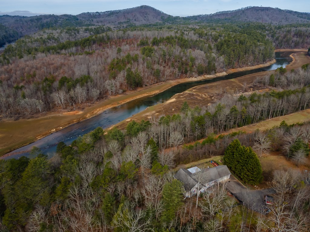 112 Deer Ridge Drive Murphy, NC 28906 - Photo 2 of 55 a view of a lake with a mountain