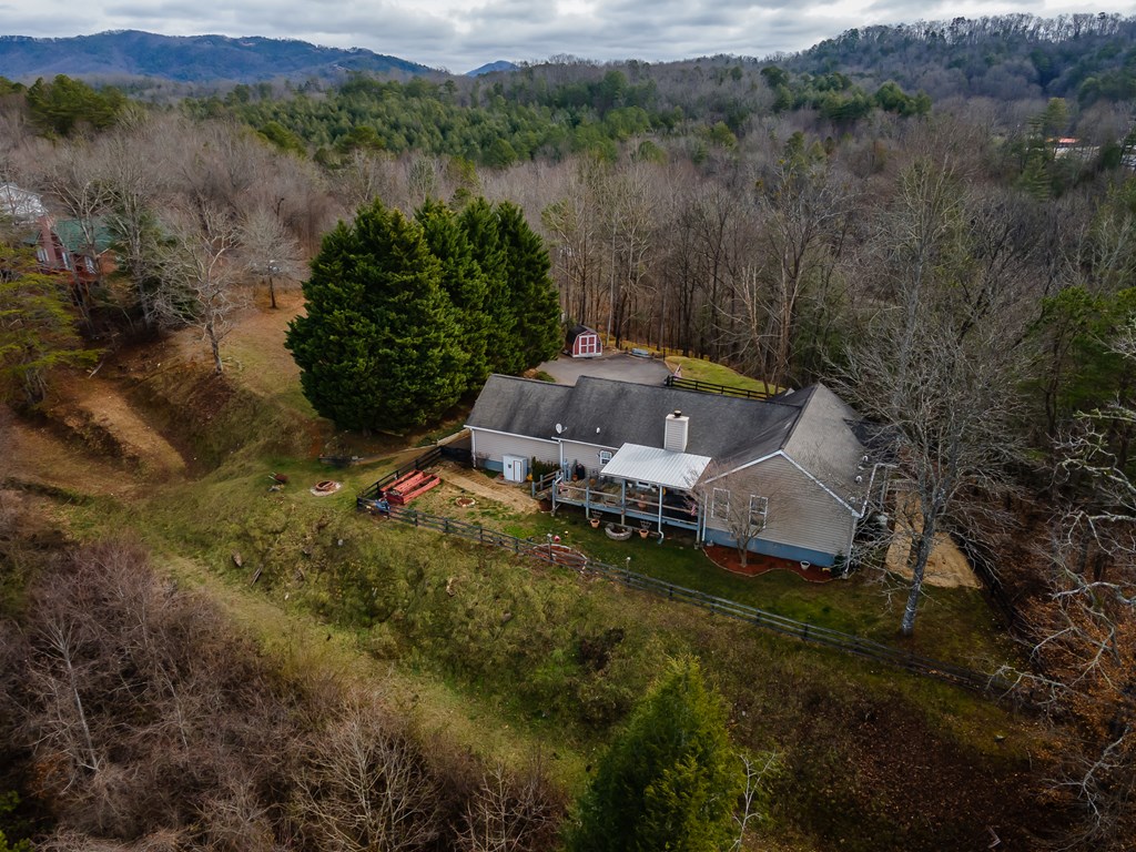 112 Deer Ridge Drive Murphy, NC 28906 - Photo 26 of 55 a view of a lake with a yard