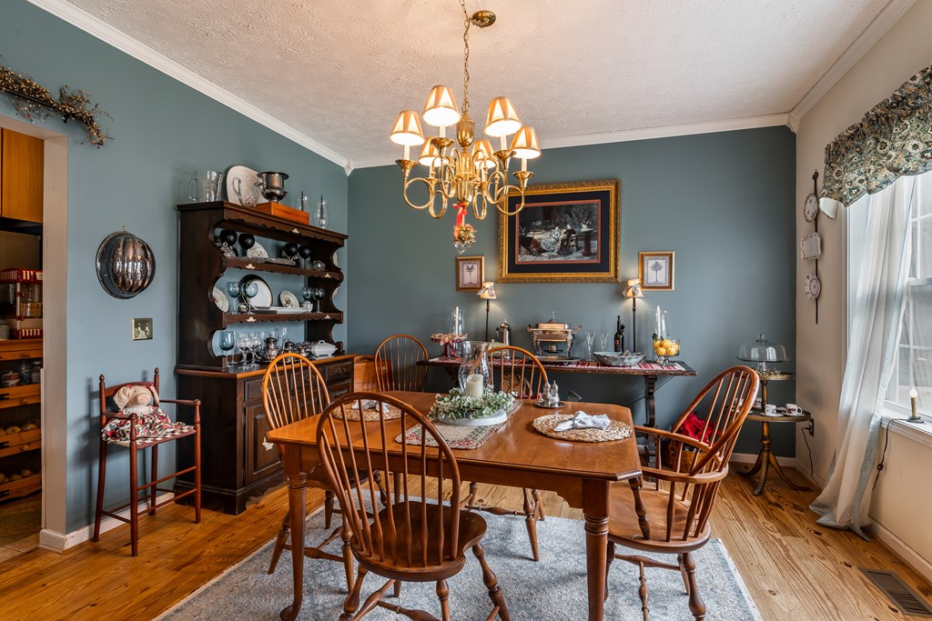 112 Deer Ridge Drive Murphy, NC 28906 - Photo 32 of 55 a view of a dining room with furniture and chandelier