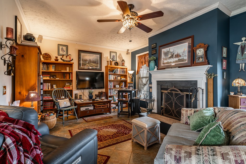 112 Deer Ridge Drive Murphy, NC 28906 - Photo 38 of 55 a living room with furniture and a fireplace