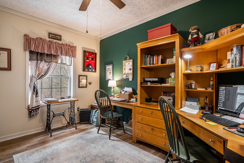 112 Deer Ridge Drive Murphy, NC 28906 - Photo 44 of 55 a room with furniture a bookshelf and a window