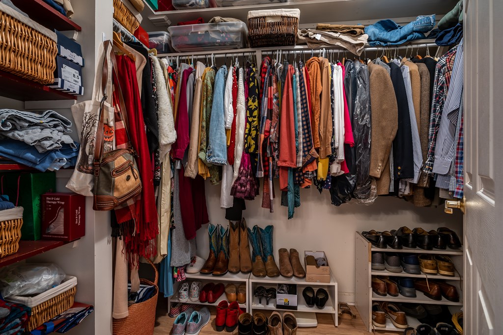 112 Deer Ridge Drive Murphy, NC 28906 - Photo 50 of 55 a view of walk in closet with clothes and shoes