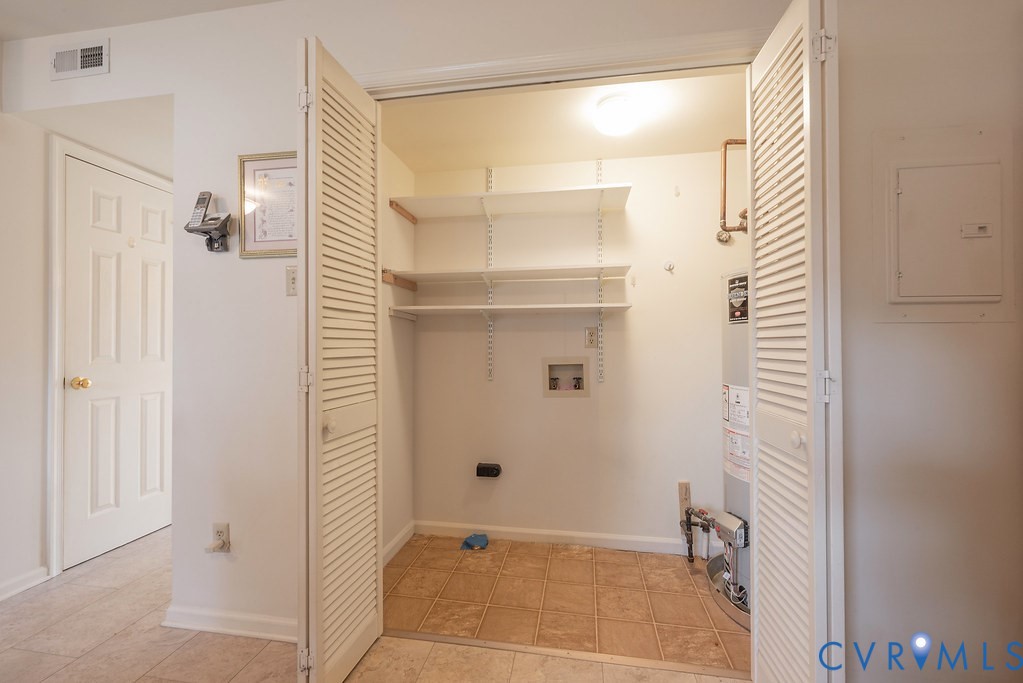 6332 Springcrest Lane Richmond, VA 23231 - Photo 11 of 38 a bathroom with a shower and a sink