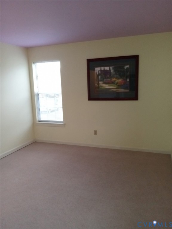 6332 Springcrest Lane Richmond, VA 23231 - Photo 21 of 38 an empty room with windows