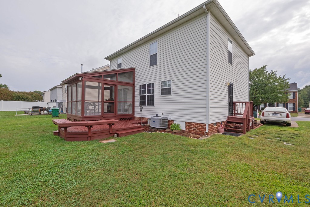 6332 Springcrest Lane Richmond, VA 23231 - Photo 31 of 38 a backyard of a house with table and chairs