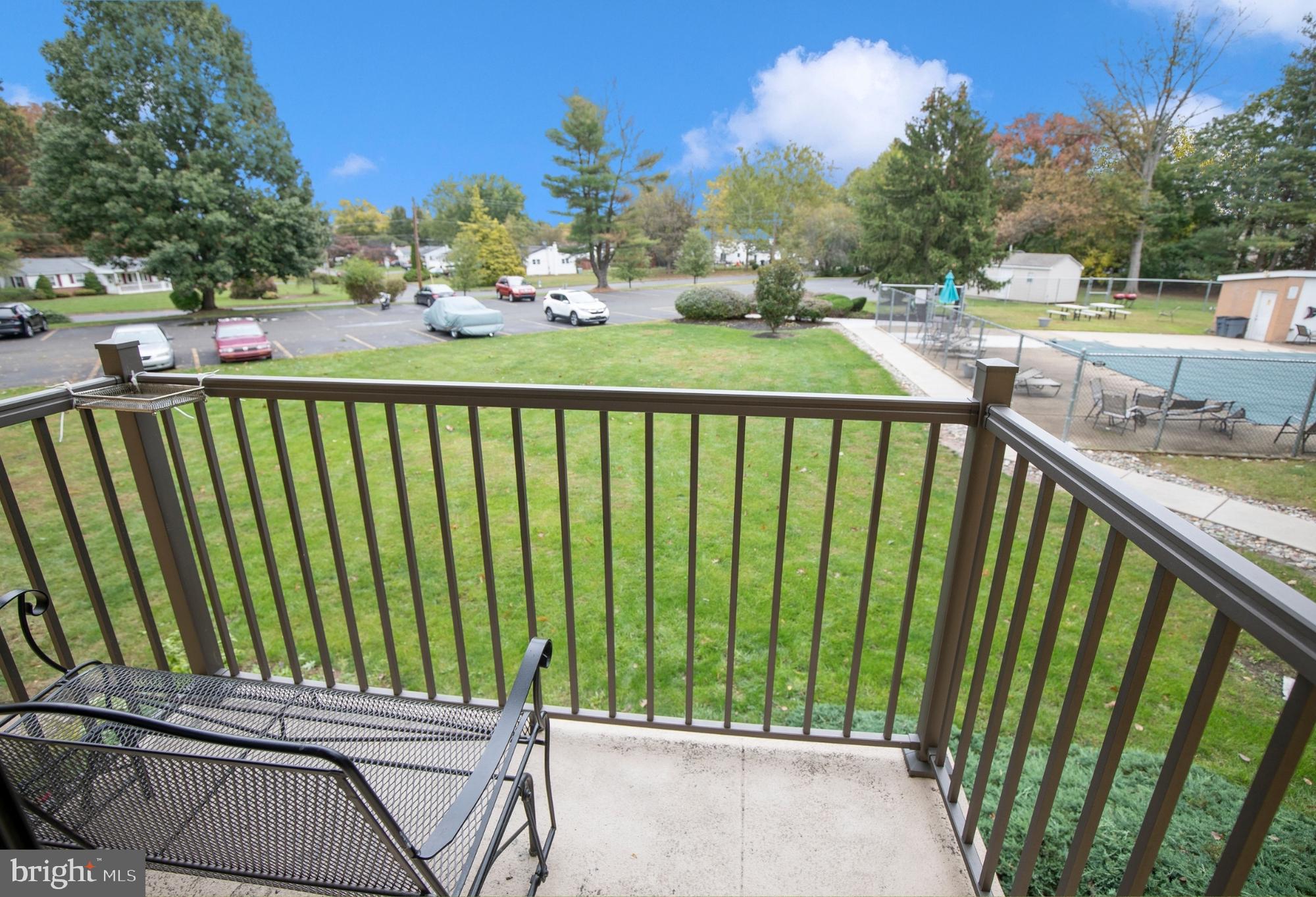 1575 West Street Road, Unit 626 Warminster, PA 18974 - Photo 20 of 22 a view of a balcony with wooden floor