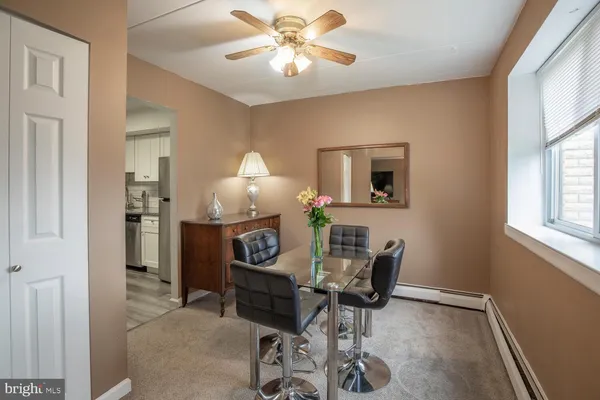 a room with furniture and wooden floor