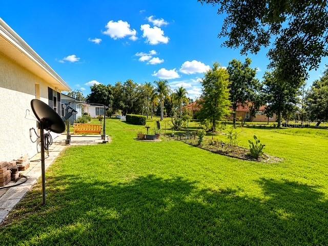 1629 Willow Run Sebring, FL 33872 - Photo 12 of 16 a view of a golf course with a swimming pool