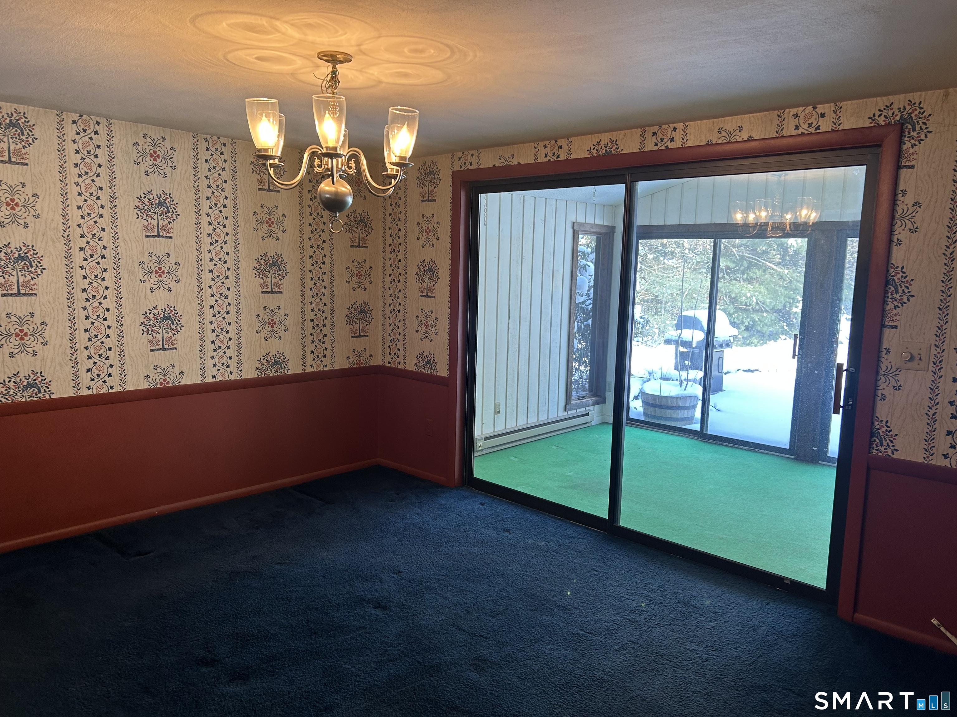 65 Munson Road Wolcott, CT 06716 - Photo 16 of 28 an empty room with windows and outdoor view
