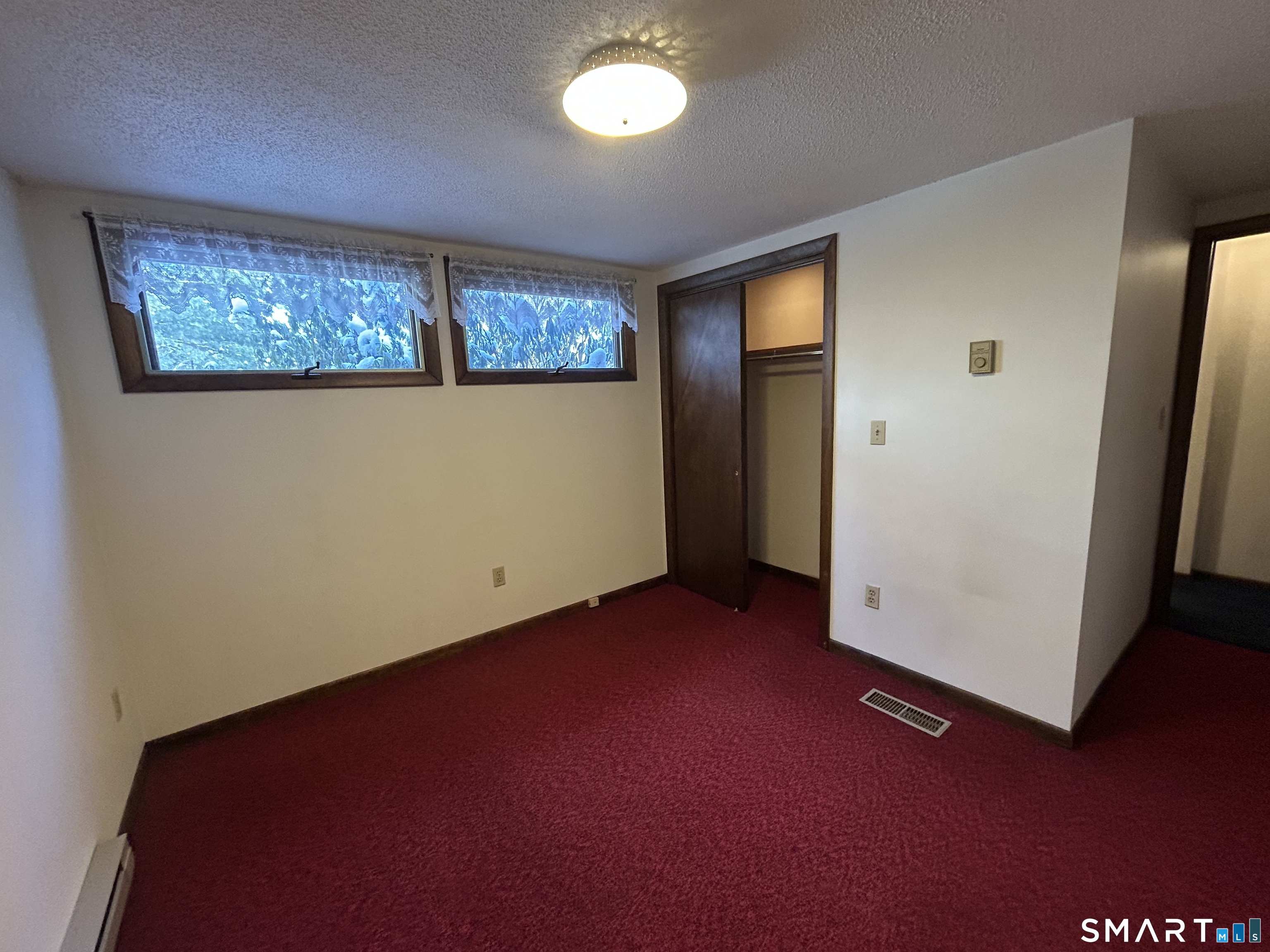 65 Munson Road Wolcott, CT 06716 - Photo 20 of 28 an empty room with windows