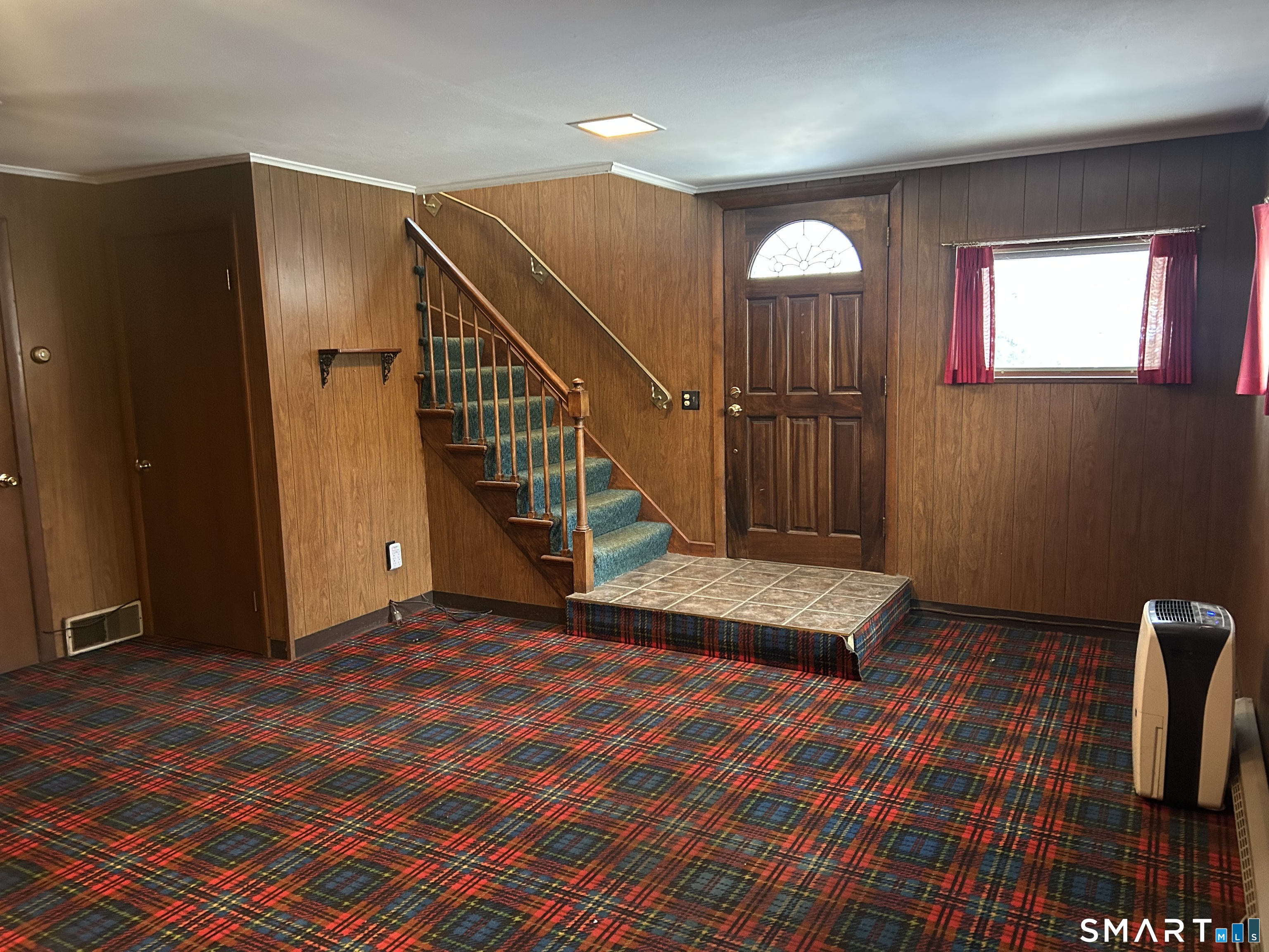 65 Munson Road Wolcott, CT 06716 - Photo 24 of 28 a view of entryway with wooden floor