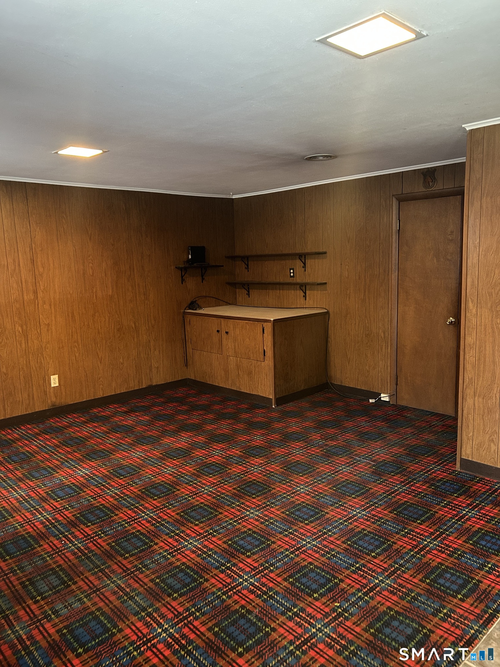 65 Munson Road Wolcott, CT 06716 - Photo 25 of 28 a view of a room with wooden floor