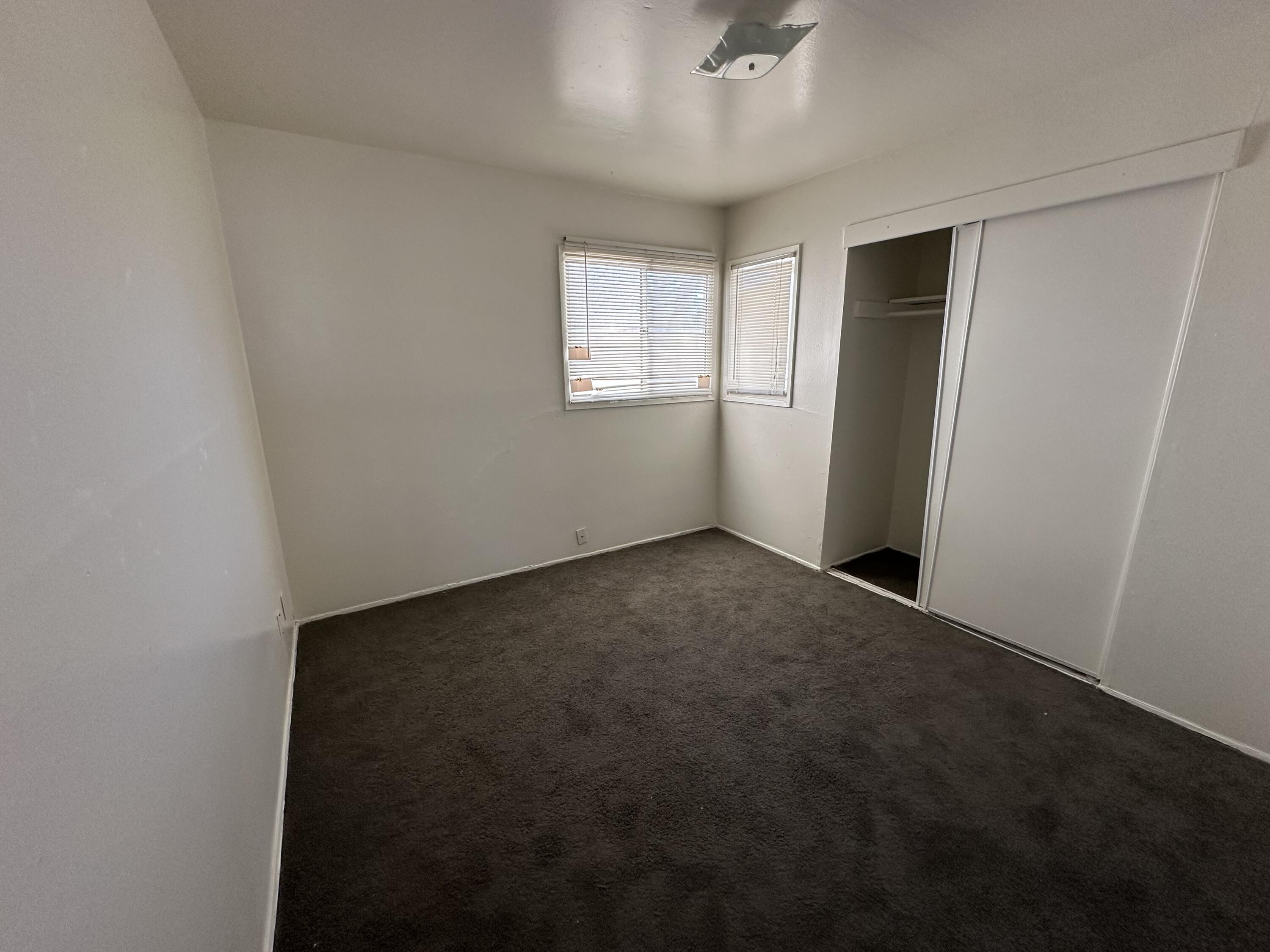 45433 Lorimer Avenue Lancaster, CA 93534 - Photo 17 of 23 an empty room with windows