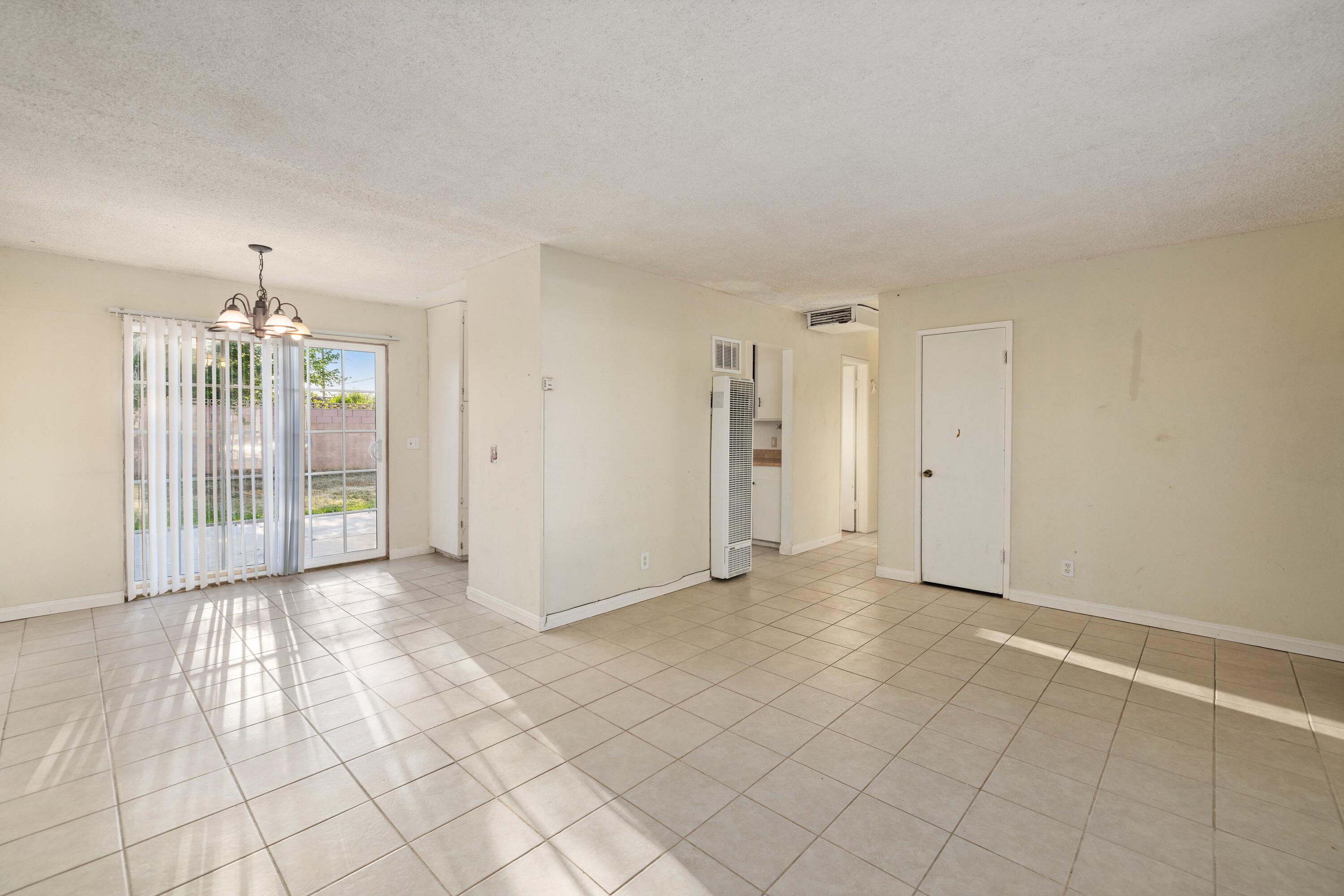 45433 Lorimer Avenue Lancaster, CA 93534 - Photo 6 of 23 a view of an empty room and window