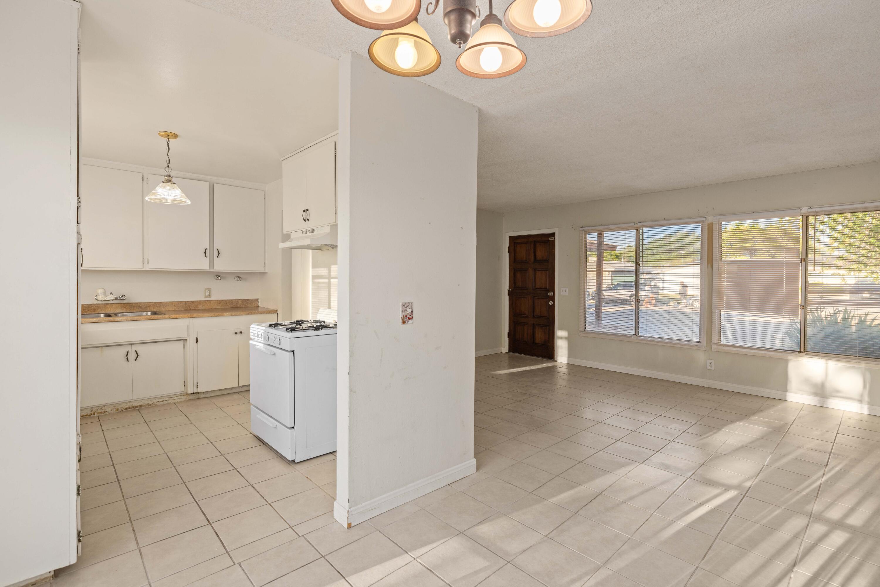 45433 Lorimer Avenue Lancaster, CA 93534 - Photo 9 of 23 a view of a kitchen with electric appliances