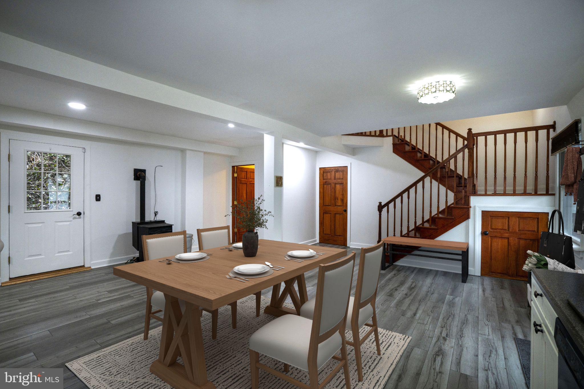 874 Spring Creek Road Bellefonte, PA 16823 - Photo 16 of 45 a view of a dining room with furniture and wooden floor