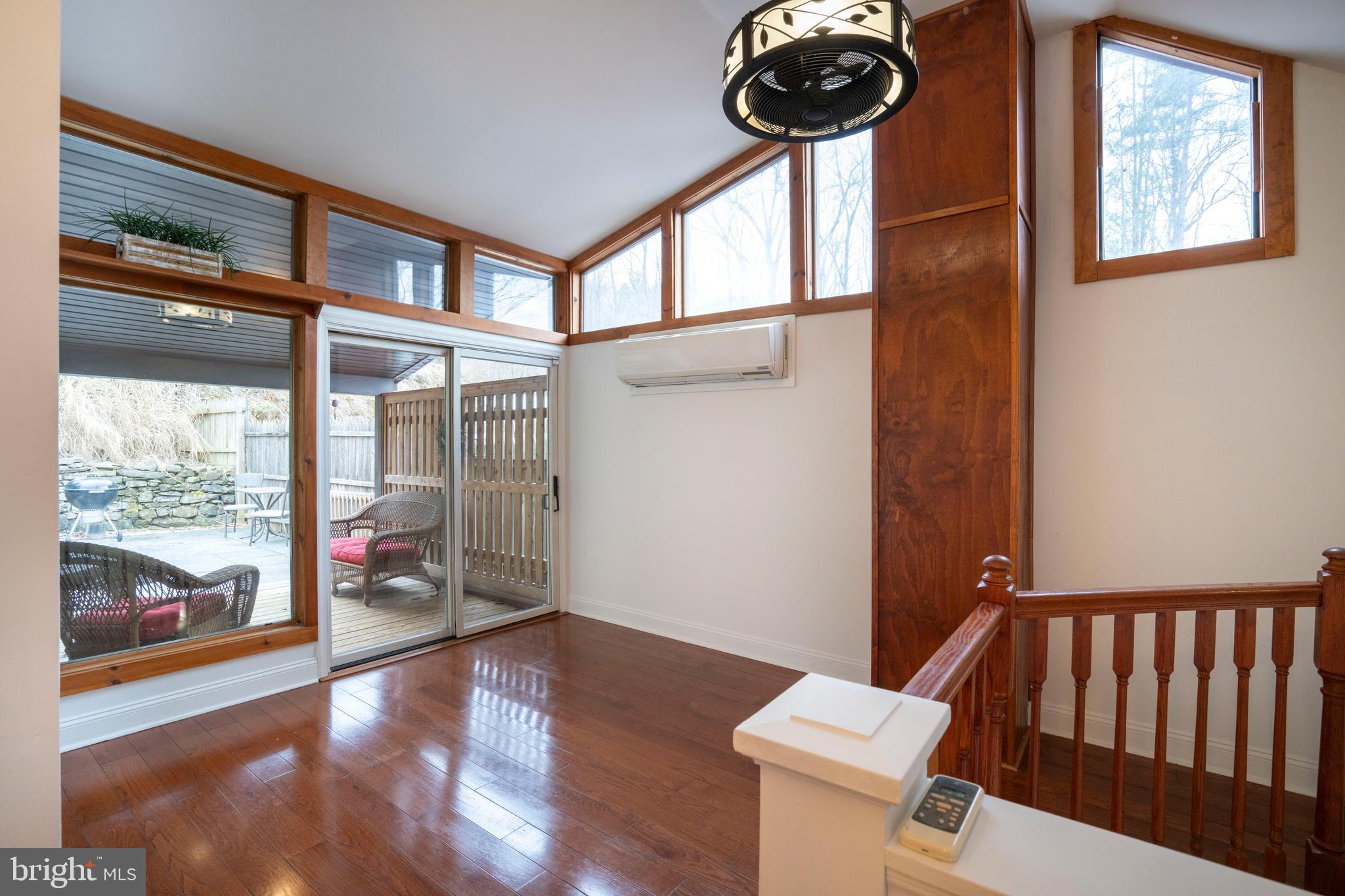 874 Spring Creek Road Bellefonte, PA 16823 - Photo 20 of 45 a view of livingroom with furniture wooden floor and windows
