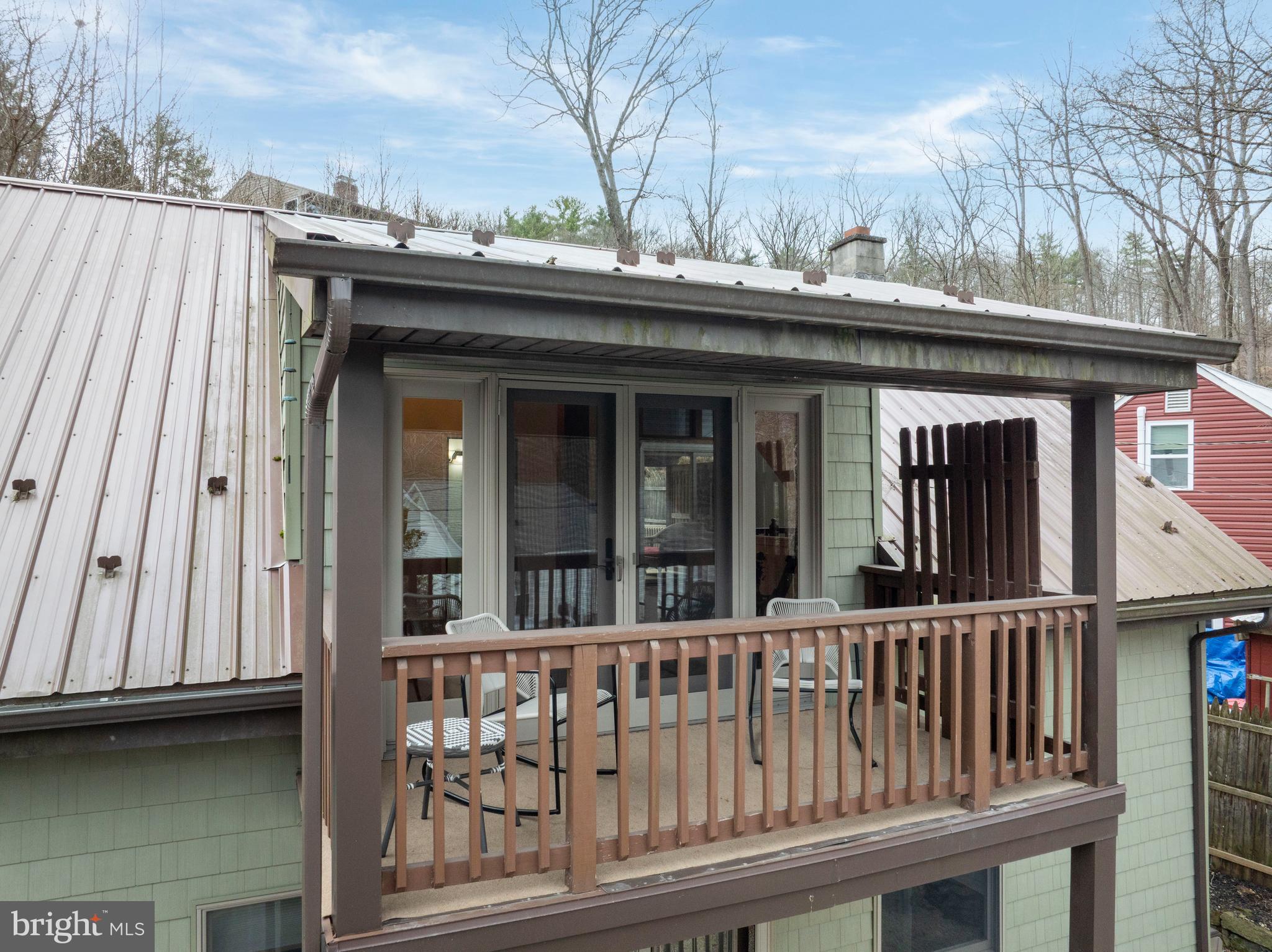 874 Spring Creek Road Bellefonte, PA 16823 - Photo 28 of 45 a view of a house with wooden deck