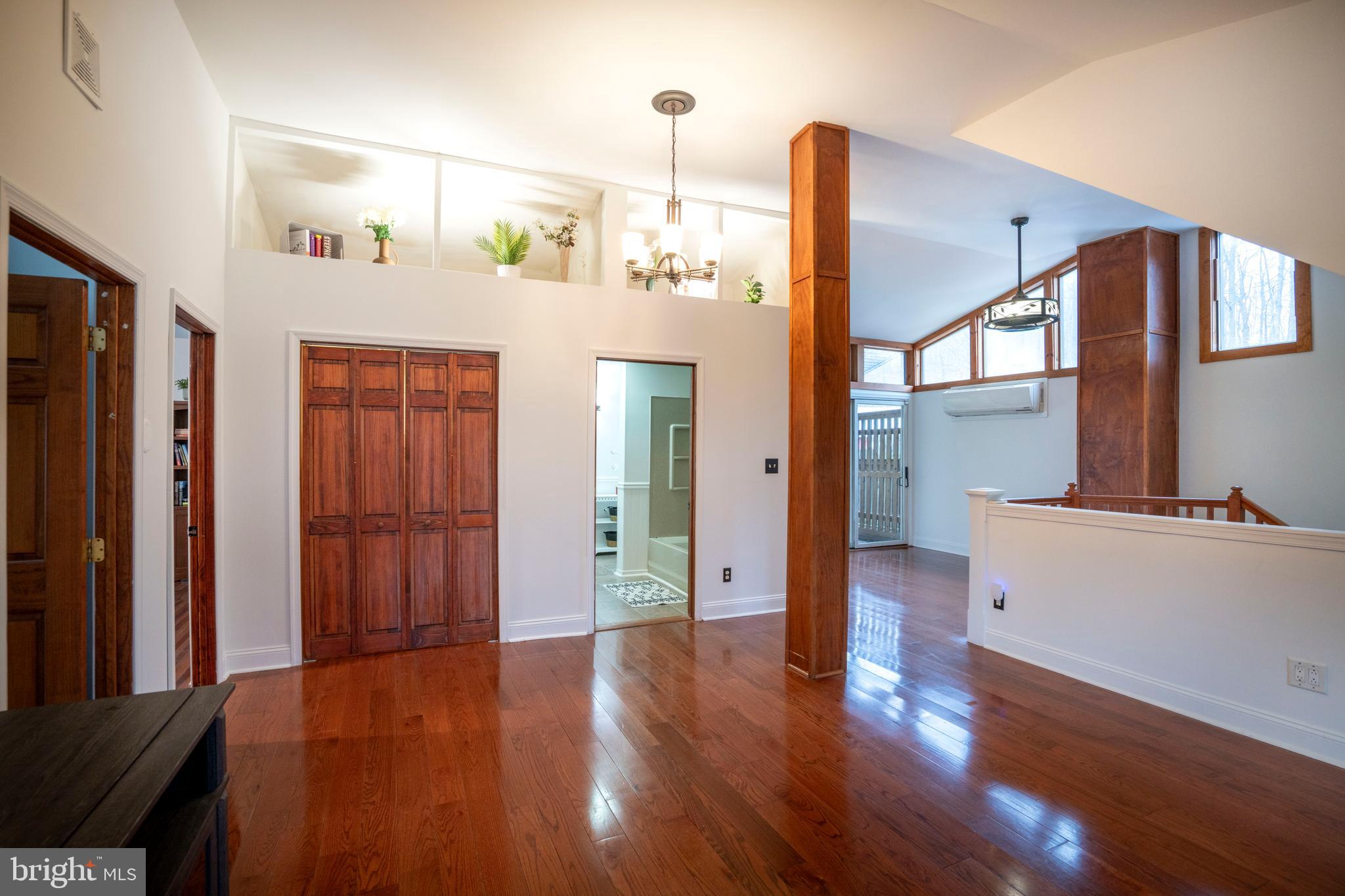 874 Spring Creek Road Bellefonte, PA 16823 - Photo 31 of 45 a view of a hallway view with wooden floor and staircase