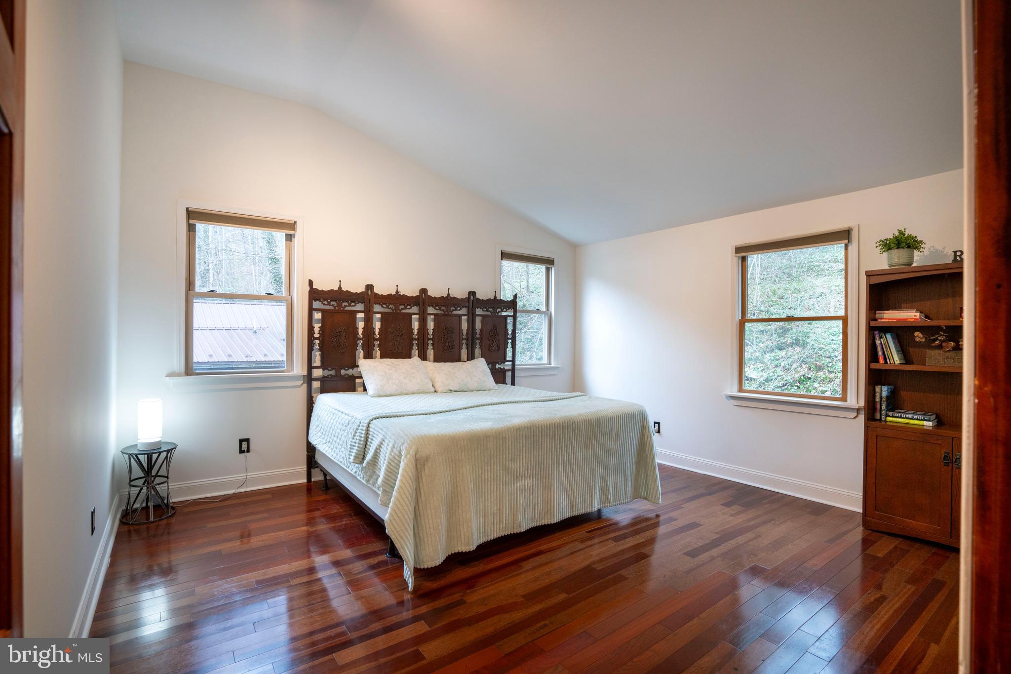 874 Spring Creek Road Bellefonte, PA 16823 - Photo 32 of 45 a bedroom with a bed and window