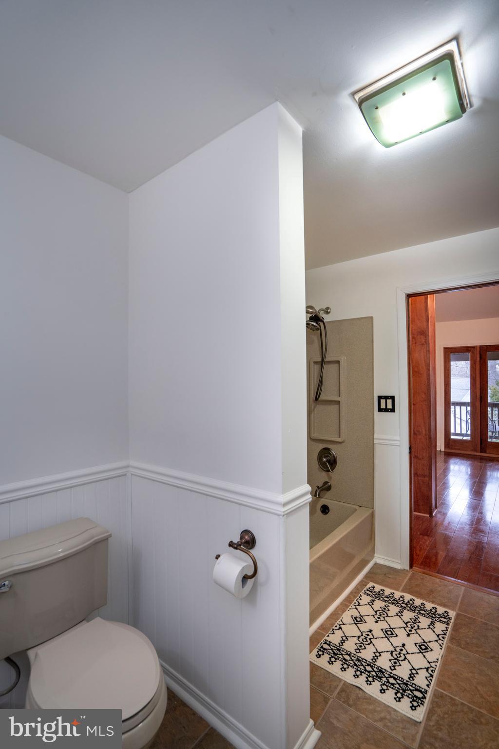 874 Spring Creek Road Bellefonte, PA 16823 - Photo 41 of 45 a bathroom with a toilet and a shower
