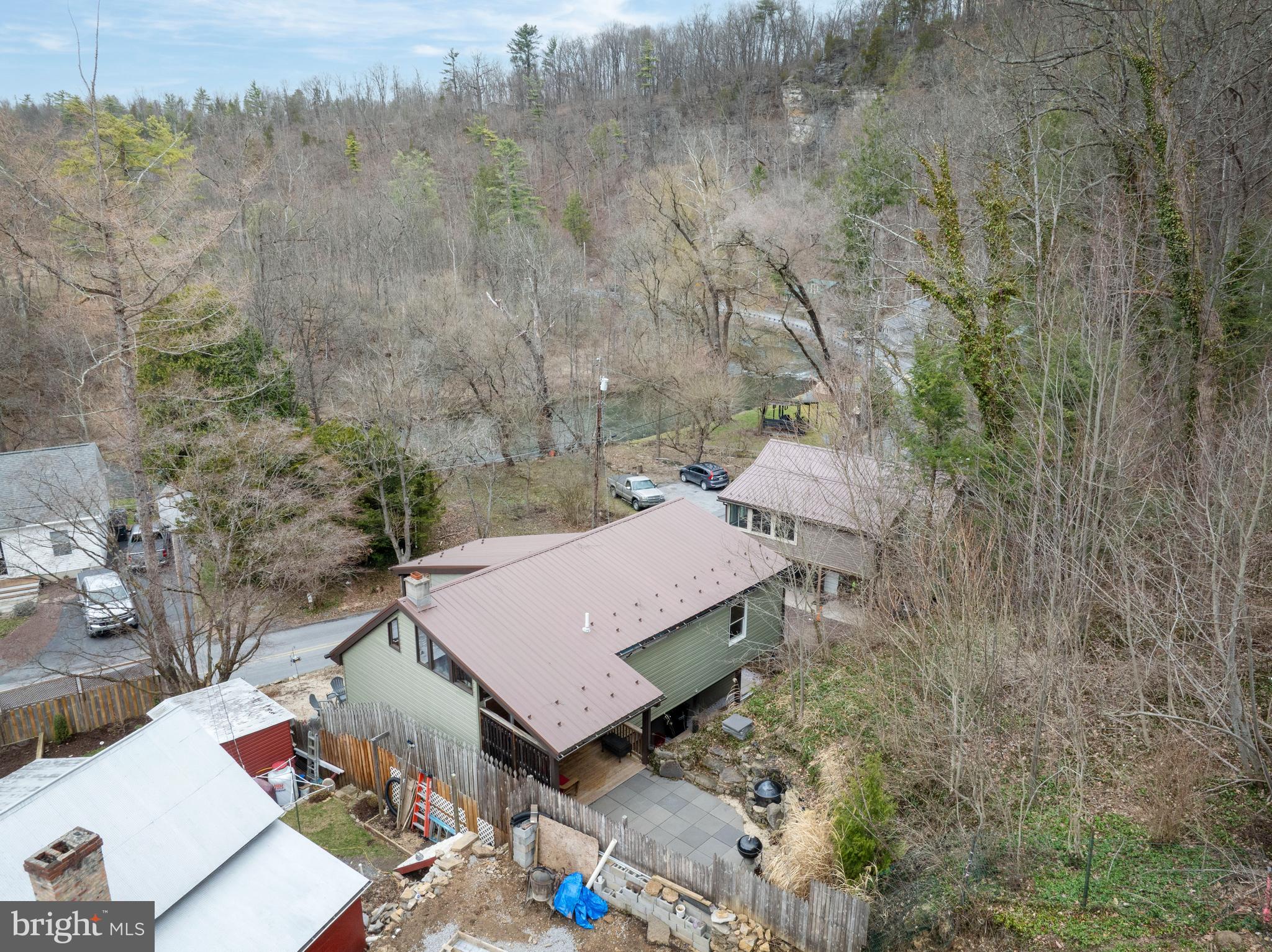 874 Spring Creek Road Bellefonte, PA 16823 - Photo 44 of 45 an aerial view of a house with yard and mountain view