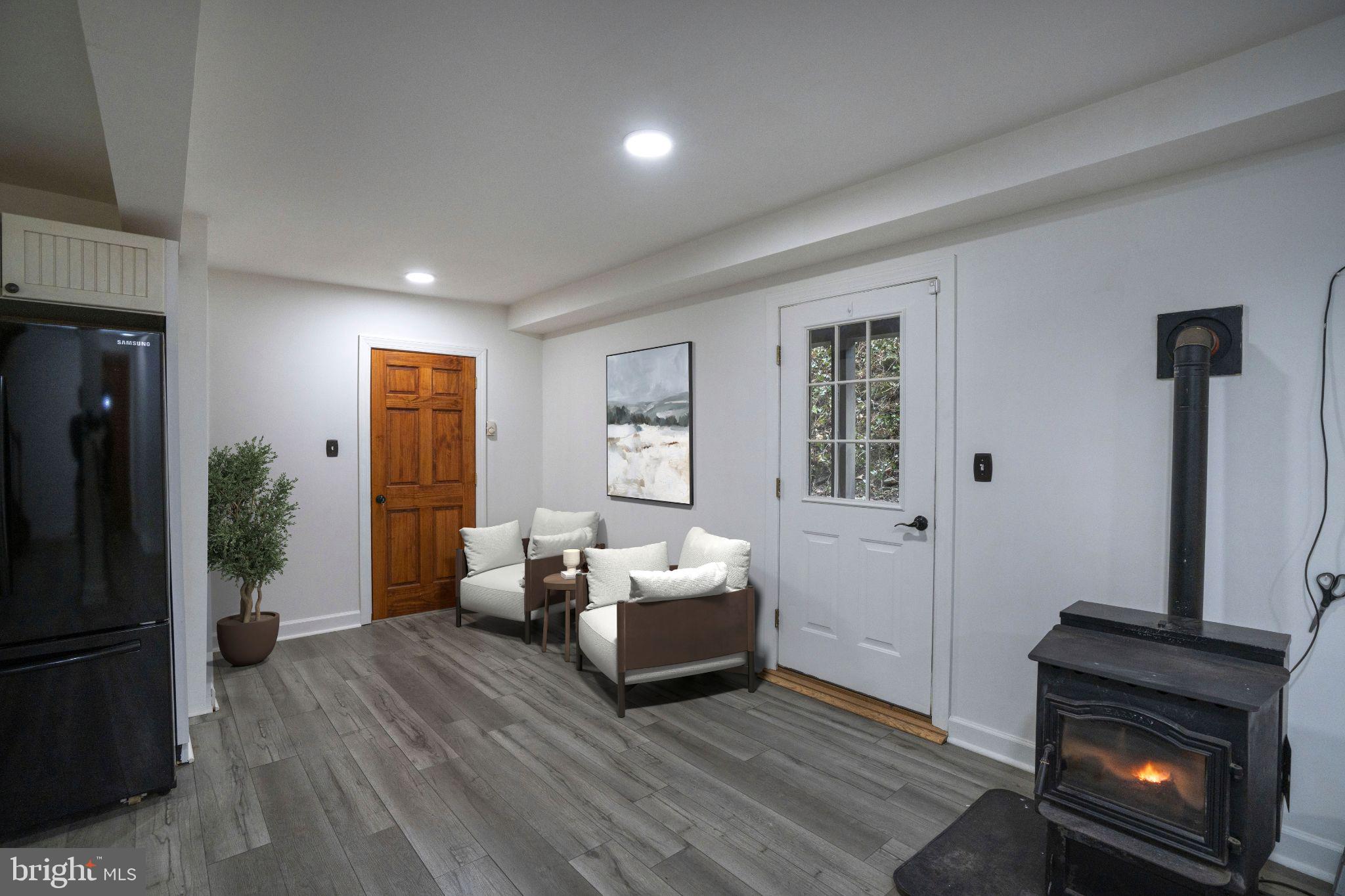 874 Spring Creek Road Bellefonte, PA 16823 - Photo 10 of 45 a living room with furniture and wooden floor