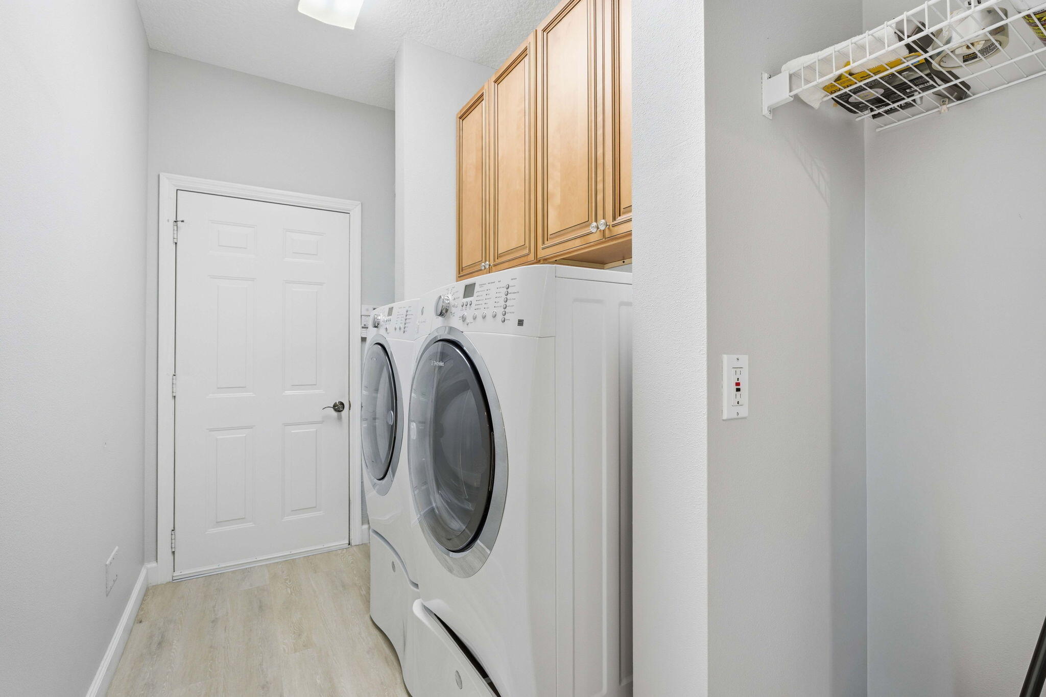 1632 Southwest Harbour Isles Circle, Unit 88 Port St. Lucie, FL 34986 - Photo 22 of 36 a close up view of a washer and dryer